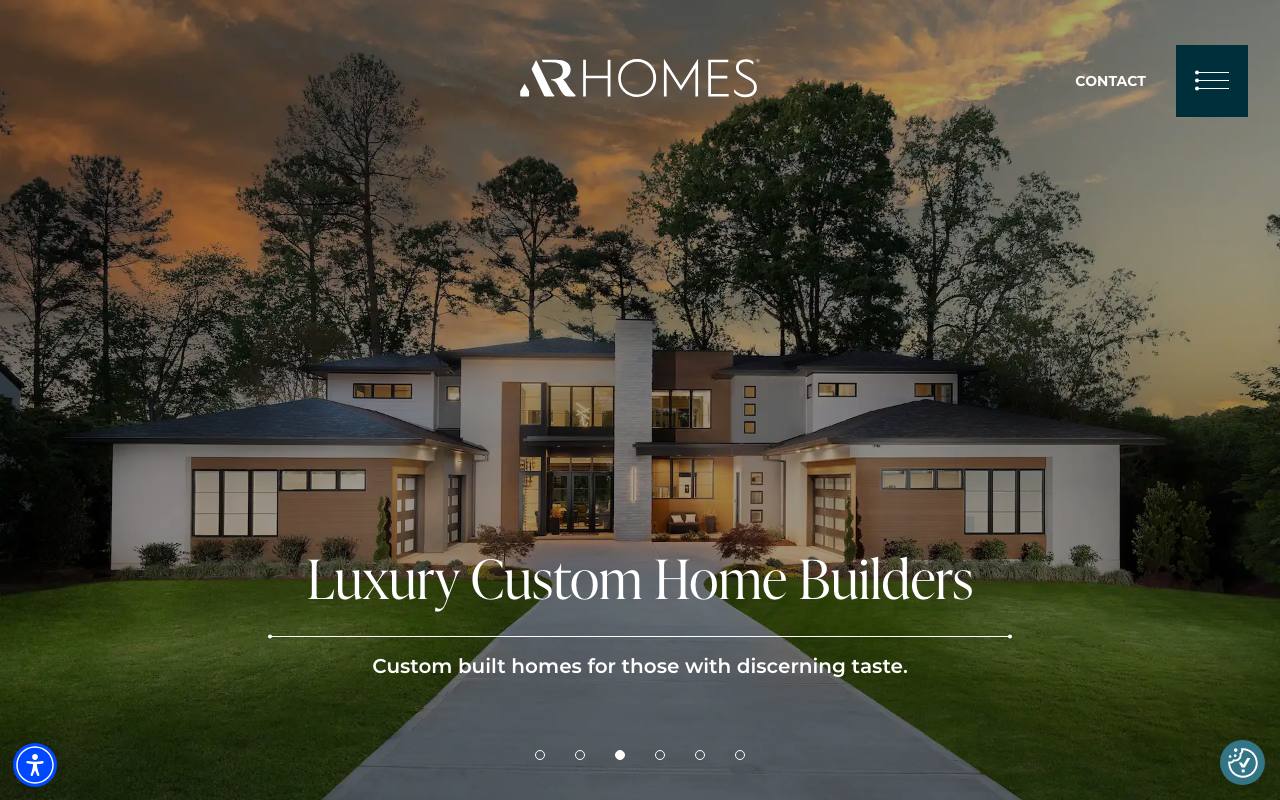 AR Homes homepage with a modern custom home at dusk and the headline "Luxury Custom Home Builders"