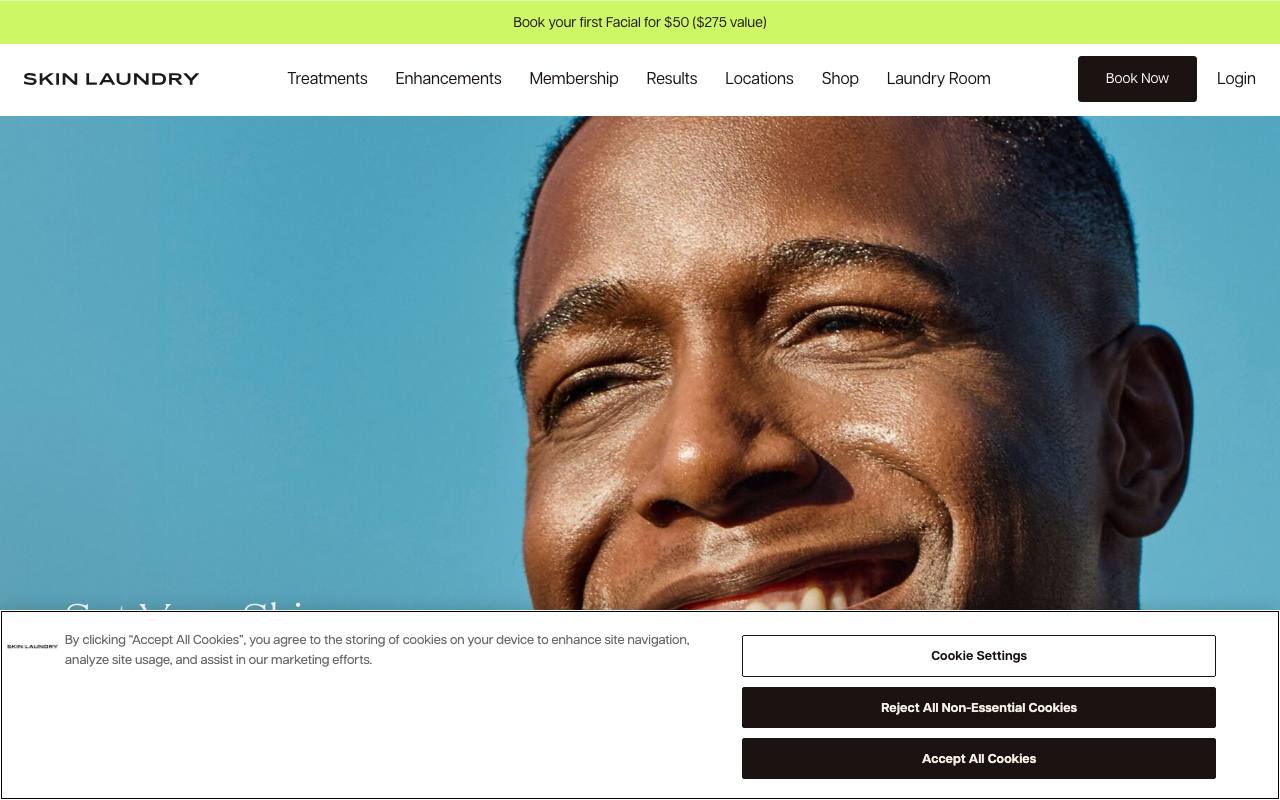 Skin Laundry homepage with clean layout and facial membership messaging